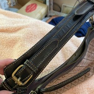 Dooney&Burke perfect condition. No wear or stains. Equestrian strap.